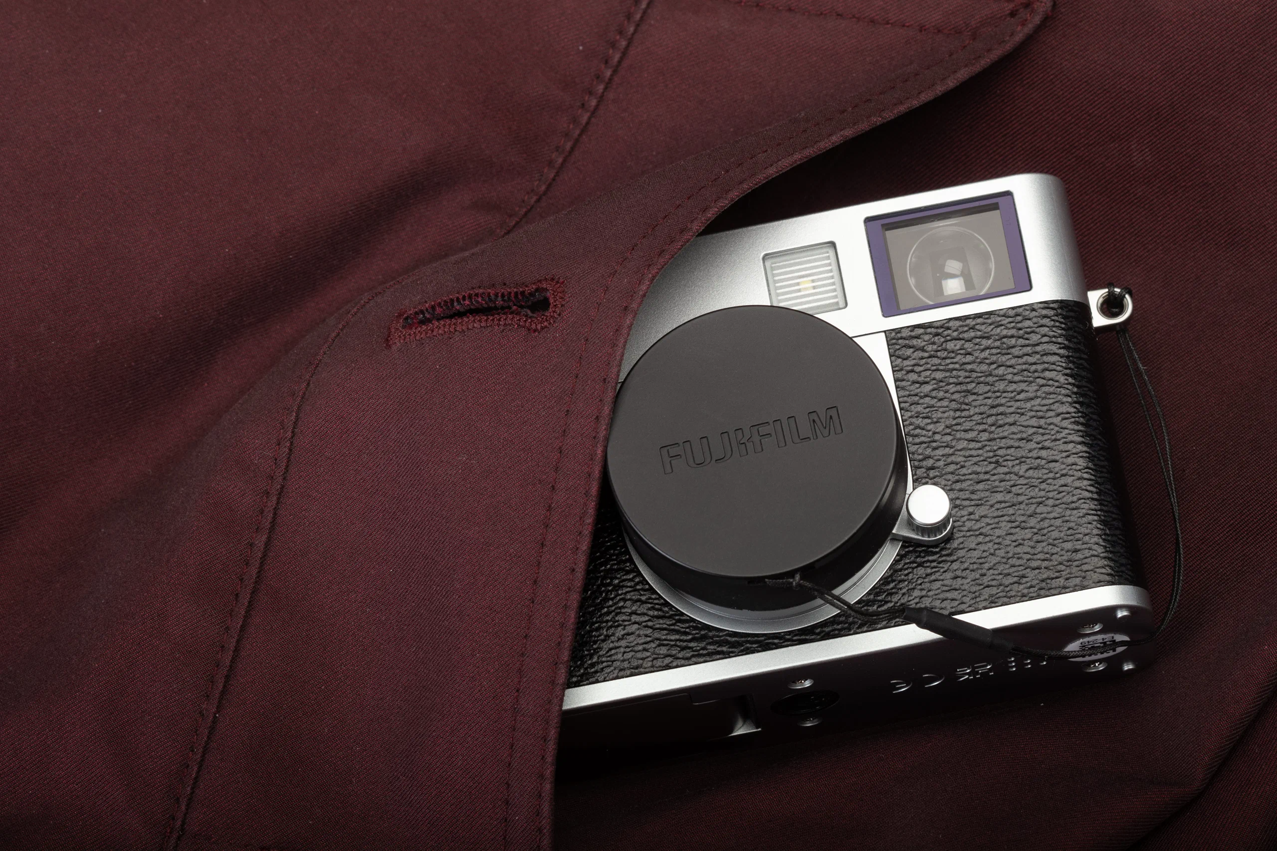 Fujifilm_X_half_in_coat_pocket